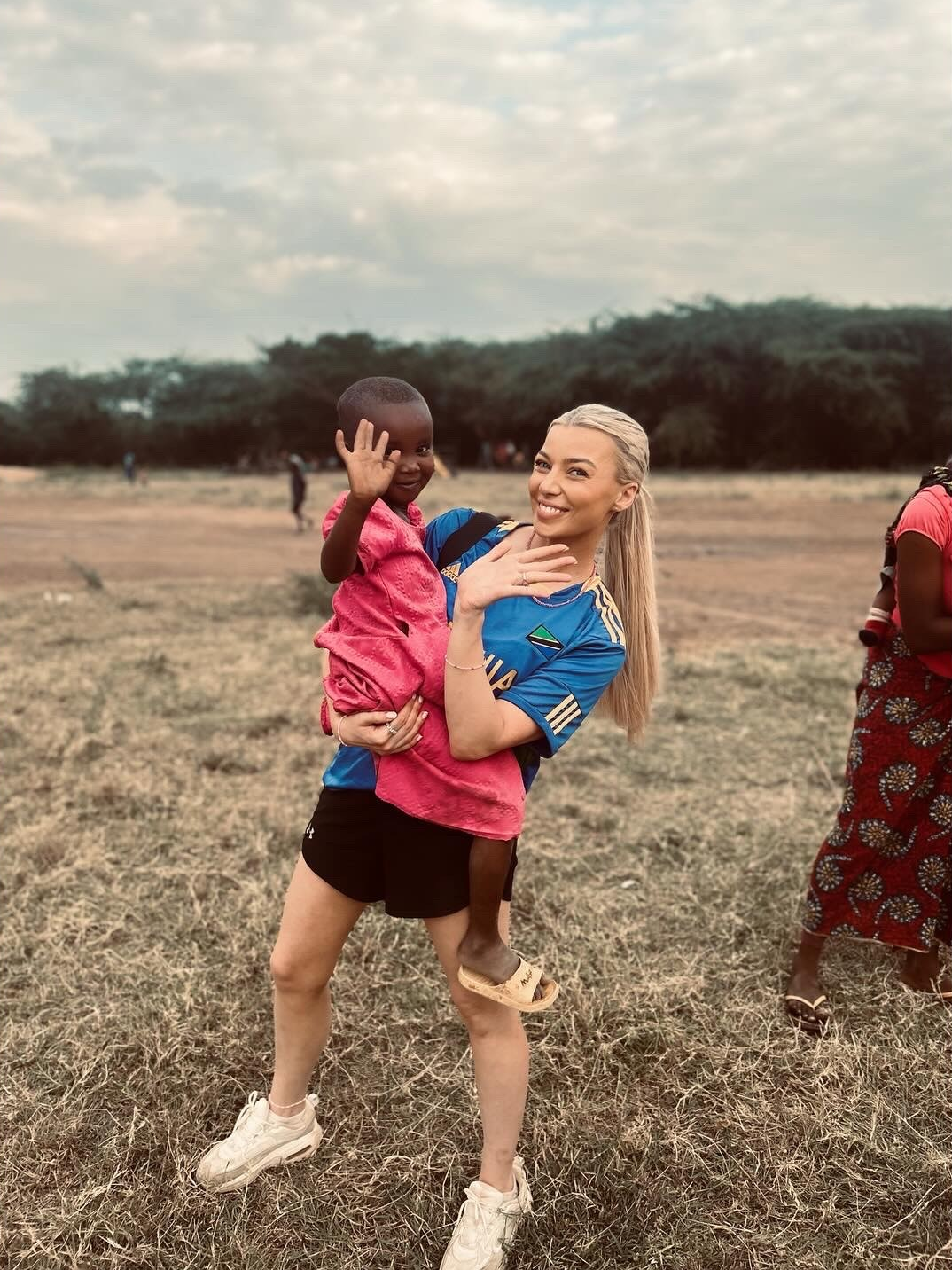 Bethany holding a child