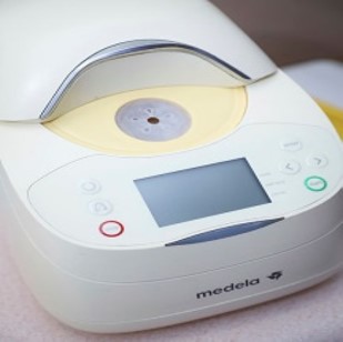 A photo of a milk warmer