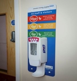 Wall-attached hand sanitiser photo